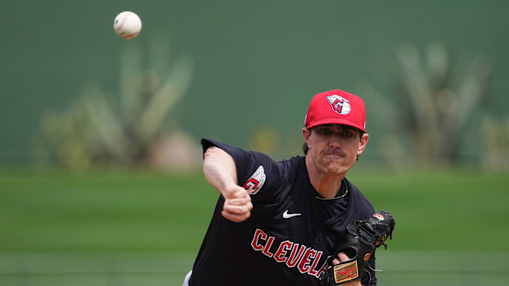 Mar 12, 2024; Surprise, Arizona, USA; Cleveland Guardians starting pitcher Shane Bieber (57) pitches against the Texas Rangers during the first inning at Surprise Stadium.