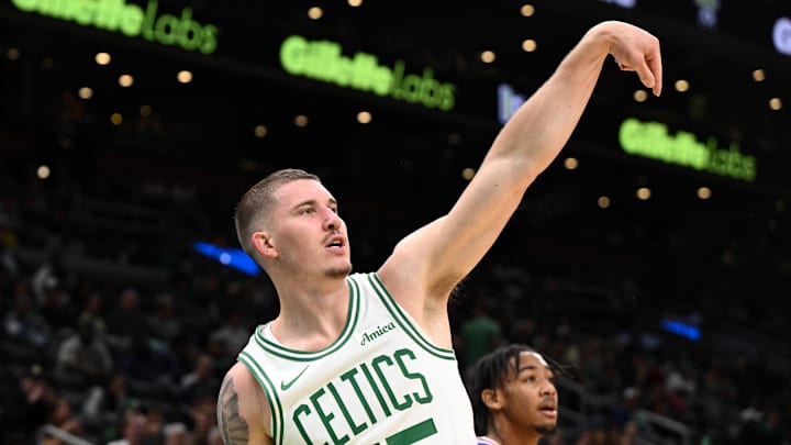 Oct 12, 2024; Boston, Massachusetts, USA; Boston Celtics forward Baylor Scheierman (55) attempts a three-point basket against the Philadelphia 76ers during the second half at the TD Garden. Mandatory Credit: Brian Fluharty-Imagn Images Oct 12, 2024; Boston, Massachusetts, USA; Boston Celtics forward Baylor Scheierman (55) attempts a three-point basket against the Philadelphia 76ers during the second half at the TD Garden. Mandatory Credit: Brian Fluharty-Imagn Images