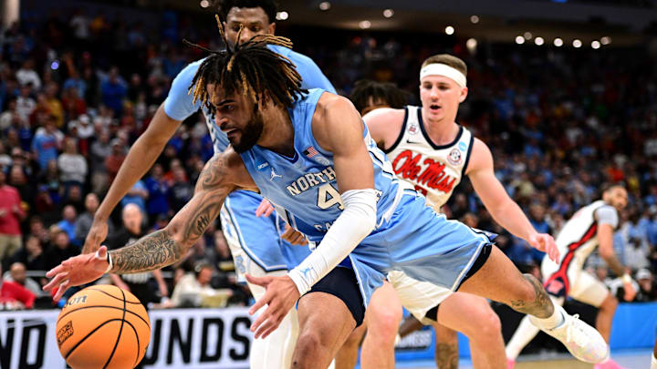Mar 21, 2025; Milwaukee, WI, USA; North Carolina Tar Heels guard RJ Davis (4) chases a loose ball during the second half of a first round NCAA men’s tournament game against the Mississippi Rebels at Fiserv Forum. Mandatory Credit: Benny Sieu-Imagn Images