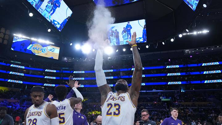 Apr 12, 2026; Los Angeles, California; Los Angeles Lakers forward LeBron James (23) throws powdered chalk into the air during the game against the Utah Jazz at the Crypto.com Arena. Apr 12, 2026; Los Angeles, California; Los Angeles Lakers forward LeBron James (23) throws powdered chalk into the air during the game against the Utah Jazz at the Crypto.com Arena.