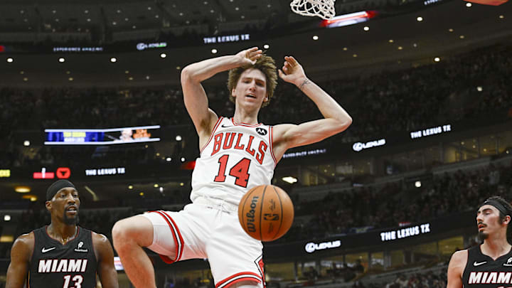 Feb 4, 2025; Chicago, Illinois, USA;  Chicago Bulls forward Matas Buzelis (14) dunks the ball against the Miami Heat during the first half at United Center. Mandatory Credit: Matt Marton-Imagn Images