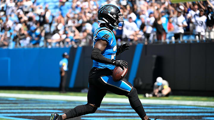 Sep 21, 2025; Charlotte, North Carolina, USA; Carolina Panthers cornerback Chau Smith-Wade (26) scores a touchdown after intercepting the ball in the third quarter at Bank of America Stadium. Mandatory Credit: Bob Donnan-Imagn Images Sep 21, 2025; Charlotte, North Carolina, USA; Carolina Panthers cornerback Chau Smith-Wade (26) scores a touchdown after intercepting the ball in the third quarter at Bank of America Stadium. Mandatory Credit: Bob Donnan-Imagn Images