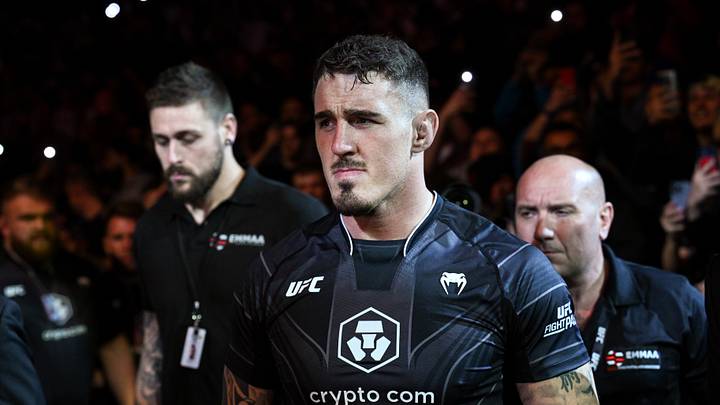 Jul 22, 2023; London, UNITED KINGDOM; Tom Aspinall (red gloves) enters the arena before the fight against Marcin Tybura (blue gloves) during UFC Fight Night at O2 Arena. Mandatory Credit: Per Haljestam-USA TODAY Sports Jul 22, 2023; London, UNITED KINGDOM; Tom Aspinall (red gloves) enters the arena before the fight against Marcin Tybura (blue gloves) during UFC Fight Night at O2 Arena. Mandatory Credit: Per Haljestam-USA TODAY Sports