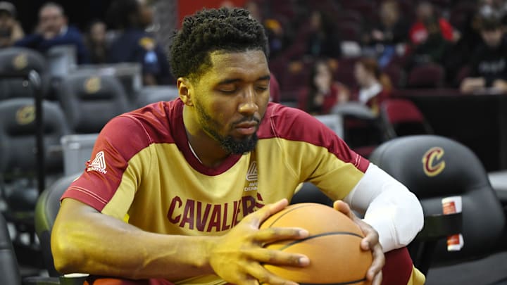 Oct 8, 2024; Cleveland, Ohio, USA; Cleveland Cavaliers guard Donovan Mitchell (45) warms up before a game against the Chicago Bulls at Rocket Mortgage FieldHouse. Mandatory Credit: David Richard-Imagn Images