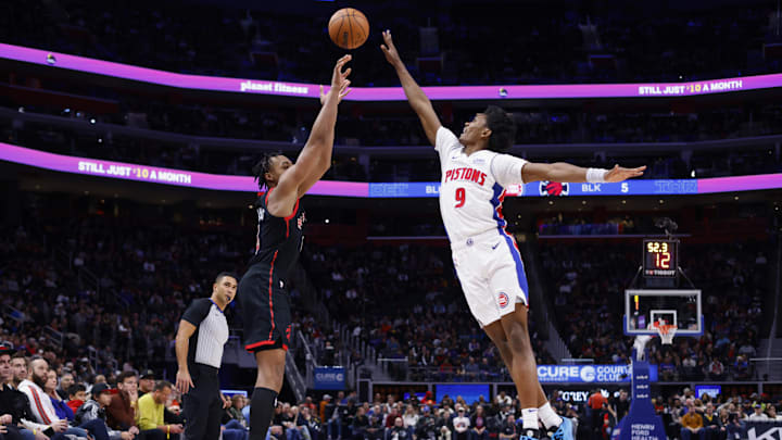 Dec 30, 2023; Detroit, Michigan, USA; Toronto Raptors forward Scottie Barnes (4) shoots on Detroit Pistons forward Ausar Thompson (9) in the second half at Little Caesars Arena. Mandatory Credit: Rick Osentoski-Imagn Images Dec 30, 2023; Detroit, Michigan, USA; Toronto Raptors forward Scottie Barnes (4) shoots on Detroit Pistons forward Ausar Thompson (9) in the second half at Little Caesars Arena. Mandatory Credit: Rick Osentoski-Imagn Images