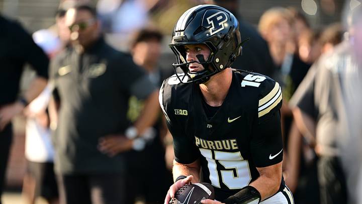 Purdue Boilermakers quarterback Ryan Browne (15) warms up prior to the game. Purdue Boilermakers quarterback Ryan Browne (15) warms up prior to the game.