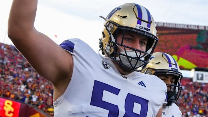 Zach Henning runs on to the field at USC for last November's game. Zach Henning runs on to the field at USC for last November's game.