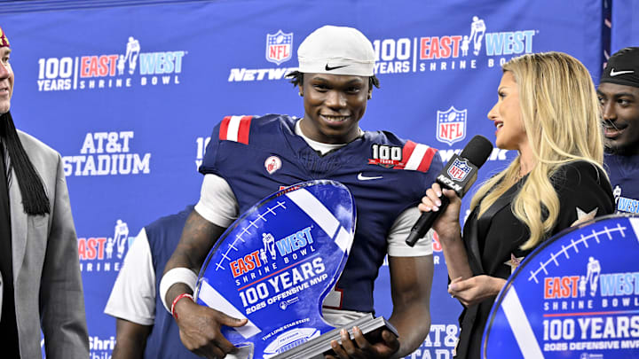 Jan 30, 2025; Arlington, TX, USA; East running back Jacory Croskey-Merritt of Arizona (31) is presented with the offensive MVP trophy after the East defeats the West in the East-West Shrine Bowl at AT&T Stadium. Mandatory Credit: Jerome Miron-Imagn Images