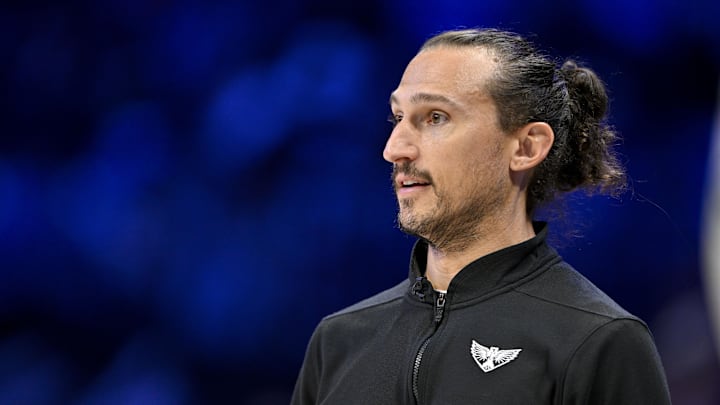 Jul 28, 2025; Arlington, Texas, USA; Dallas Wings head coach Chris Koclanes looks on during the first half against the New York Liberty at College Park Center. Mandatory Credit: Jerome Miron-Imagn Images