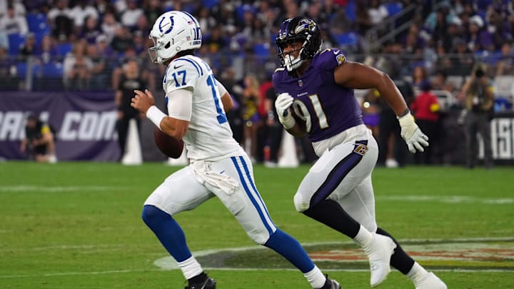 Aug 7, 2025; Baltimore, Maryland, USA; Indianapolis Colts quarterback Daniel Jones (17) pressured by Baltimore Ravens lineman C.J. Ravenell (91) during the second quarter at M&T Bank Stadium. Mandatory Credit: Mitch Stringer-Imagn Images
