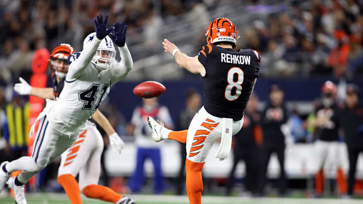 Dec 9, 2024; Arlington, Texas, USA; Dallas Cowboys linebacker Nick Vigil (41) blocks a punt by Cincinnati Bengals punter Ryan Rehkow (8) in the fourth quarter at AT&T Stadium. Mandatory Credit: Tim Heitman-Imagn Images