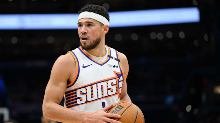 Jan 16, 2025; Washington, District of Columbia, USA; Phoenix Suns guard Devin Booker (1) looks on during the third quarter against the Washington Wizards at Capital One Arena. Mandatory Credit: Reggie Hildred-Imagn Images