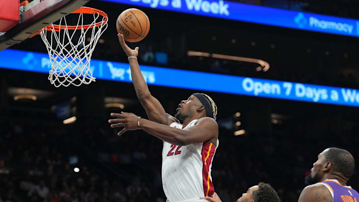 Nov 6, 2024; Phoenix, Arizona, USA; Miami Heat forward Jimmy Butler (22) puts up a layup against the Phoenix Suns during the second half at Footprint Center. Mandatory Credit: Joe Camporeale-Imagn Images Nov 6, 2024; Phoenix, Arizona, USA; Miami Heat forward Jimmy Butler (22) puts up a layup against the Phoenix Suns during the second half at Footprint Center. Mandatory Credit: Joe Camporeale-Imagn Images