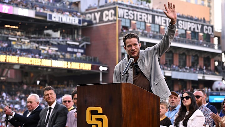 Jul 28, 2023; San Diego, California, USA; San Diego Padres former pitcher Jake Peavy waves to the crowd after being inducted into the Padres Hall of Fame before the game against the Texas Rangers at Petco Park. Mandatory Credit: Orlando Ramirez-Imagn Images 