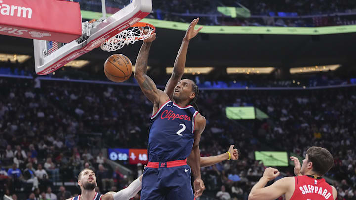 Los Angeles Clippers guard Kawhi Leonard dunks against the Houston Rockets.