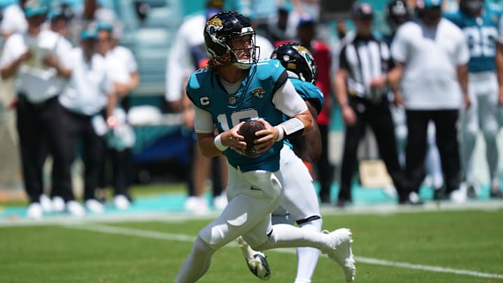 Sep 8, 2024; Miami Gardens, Florida, USA;  Jacksonville Jaguars quarterback Trevor Lawrence (16) drops back to pass against the Miami Dolphins in the first quarter at Hard Rock Stadium. Mandatory Credit: Jim Rassol-Imagn Images
