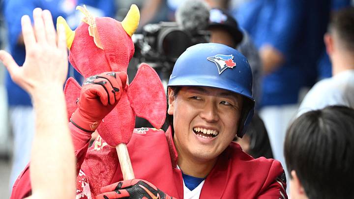 Aug 30, 2026; Toronto, Ontario, CAN;  Toronto Blue Jays third baseman Kazuma Okamoto (7) celebrates with team mates in the dugout after hitting a solo home run against the Seattle Mariners in the sixth inning at Rogers Centre.  Mandatory Credit: Dan Hamilton-Imagn Images