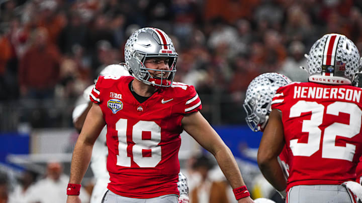 Ohio State quarterback Will Howard (18) yells instructions to his team during the College Football Playoff semifinal game against the Texas Longhorns in the Cotton Bowl at AT&T Stadium on Friday, Jan. 10, 2024 in Arlington, Texas.
