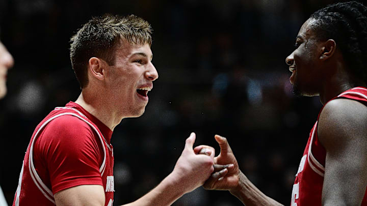 Feb 15, 2025; West Lafayette, Indiana, USA; Wisconsin Badgers guard Jack Janicki (33) celebrates with guard John Blackwell (25) after defeating the Purdue Boilermakers at Mackey Arena. Mandatory Credit: Marc Lebryk-Imagn Images