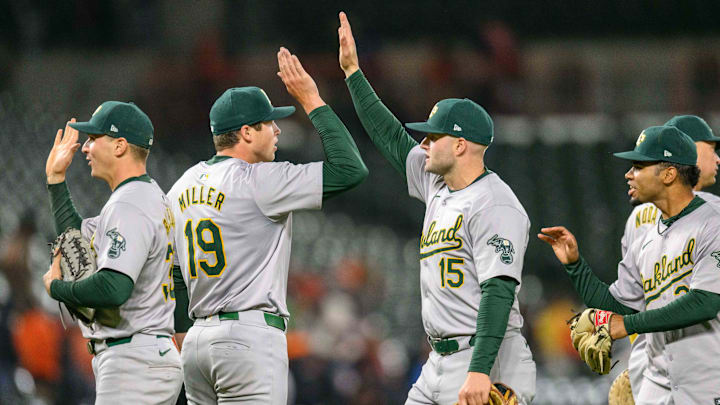 Apr 26, 2024; Baltimore, Maryland, USA; Oakland Athletics pitcher Mason Miller (19) celebrates with