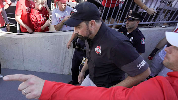 Ohio State head coach Ryan Day runs onto the field before their game against Wisconsin Saturday, October 18, 2025 at Camp Randall Stadium in Madison, Wisconsin.