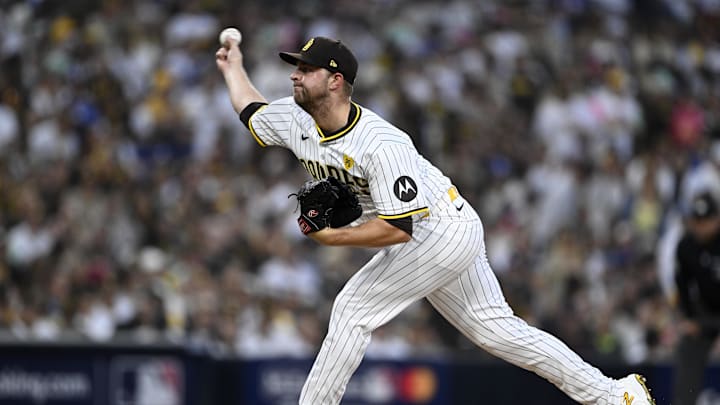 Oct 8, 2024; San Diego, California, USA; San Diego Padres pitcher Michael King (34) throws in the first inning during game three of the NLDS for the 2024 MLB Playoffs against the Los Angeles Dodgers at Petco Park.  Mandatory Credit: Denis Poroy-Imagn Images