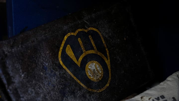 Jul 27, 2024; Milwaukee, Wisconsin, USA;  Milwaukee Brewers logo on equipment  in the dugout prior to the game against the Miami Marlins at American Family Field. Mandatory Credit: Jeff Hanisch-Imagn Images