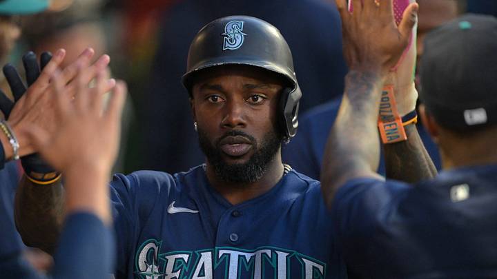 Sep 16, 2026; Anaheim, California, USA;  Seattle Mariners left fielder Randy Arozarena (56) is greeted in the dugout after scoring a run during the first inning against the Los Angeles Angels at Angel Stadium. Mandatory Credit: Jayne Kamin-Oncea-Imagn Images