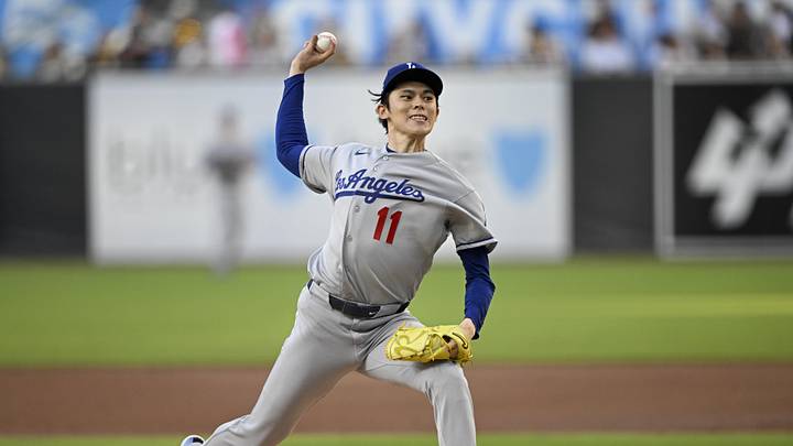 Jun 26, 2026; San Diego, California, USA; Los Angeles Dodgers pitcher Roki Sasaki (11) delivers during the second inning against the San Diego Padres at Petco Park. Mandatory Credit: Denis Poroy-Imagn Images