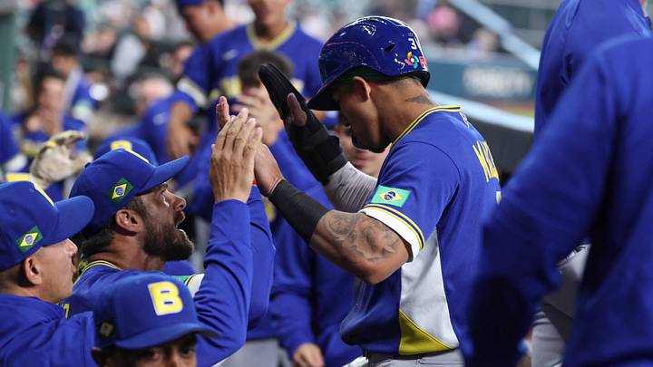 Mar 9, 2026; Houston, TX, United States; Brazil center fielder Gabriel MacIel (3) celebrates in the dugout after scoring a run during the fifth inning against Great Britain at Daikin Park. Mandatory Credit: Troy Taormina-Imagn Images