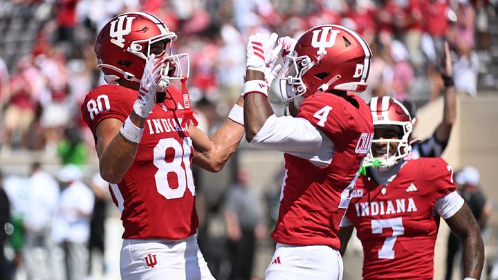 Sep 5, 2026; Bloomington, Indiana, USA; Indiana Hoosiers wide receiver Davion Chandler (4) celebrates with wide receiver Charlie Becker (80) after scoring a touchdown against the North Texas Mean Green during the fourth quarter at Merchants Bank Field at Memorial Stadium. Mandatory Credit: Robert Goddin-Imagn Images Sep 5, 2026; Bloomington, Indiana, USA; Indiana Hoosiers wide receiver Davion Chandler (4) celebrates with wide receiver Charlie Becker (80) after scoring a touchdown against the North Texas Mean Green during the fourth quarter at Merchants Bank Field at Memorial Stadium. Mandatory Credit: Robert Goddin-Imagn Images