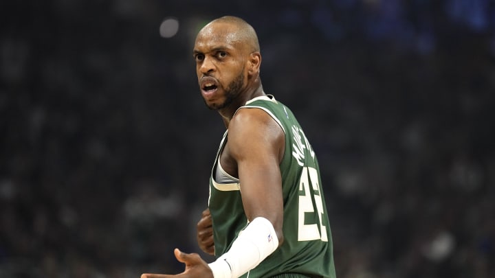 Apr 30, 2024; Milwaukee, Wisconsin, USA;  Milwaukee Bucks forward Khris Middleton (22) reacts to a call during the first quarter against the Indiana Pacers during game five of the first round for the 2024 NBA playoffs at Fiserv Forum. Mandatory Credit: Jeff Hanisch-USA TODAY Sports