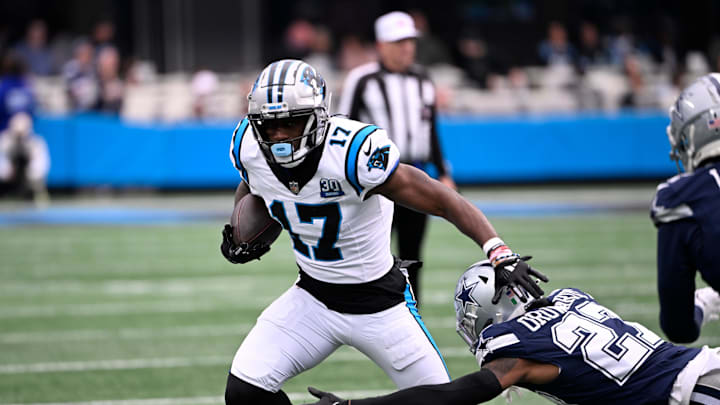 Dec 15, 2024; Charlotte, North Carolina, USA; Carolina Panthers wide receiver Xavier Legette (17) with the ball as Dallas Cowboys cornerback Amani Oruwariye (27) defefends in the first quarter at Bank of America Stadium. Mandatory Credit: Bob Donnan-Imagn Images Dec 15, 2024; Charlotte, North Carolina, USA; Carolina Panthers wide receiver Xavier Legette (17) with the ball as Dallas Cowboys cornerback Amani Oruwariye (27) defefends in the first quarter at Bank of America Stadium. Mandatory Credit: Bob Donnan-Imagn Images