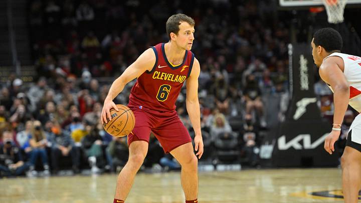 Dec 26, 2021; Cleveland, Ohio, USA; Cleveland Cavaliers guard Kevin Pangos (6) runs the offense in the fourth quarter against the Toronto Raptors at Rocket Mortgage FieldHouse. Dec 26, 2021; Cleveland, Ohio, USA; Cleveland Cavaliers guard Kevin Pangos (6) runs the offense in the fourth quarter against the Toronto Raptors at Rocket Mortgage FieldHouse.