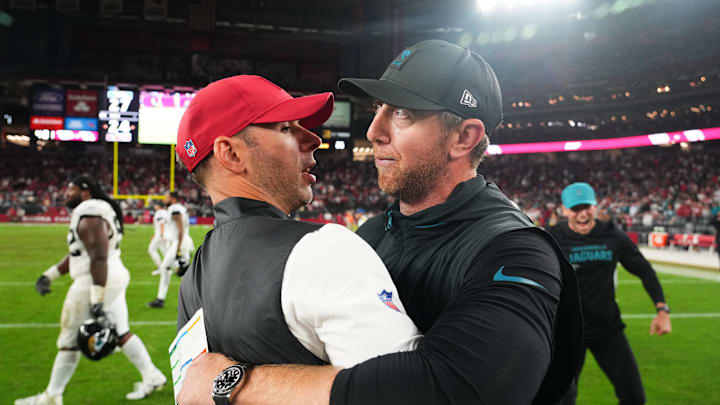 Nov 23, 2025; Glendale, Arizona, USA; Jacksonville Jaguars head coach Liam Coen greets Arizona Cardinals head coach Jonathan Gannon on the field after the game at State Farm Stadium. Mandatory Credit: Joe Camporeale-Imagn Images