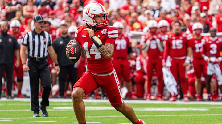 Sep 13, 2025; Lincoln, Nebraska, USA; Nebraska Cornhuskers quarterback TJ Lateef (14) scrambles against the Houston Christian Huskies during the third quarter at Memorial Stadium. Mandatory Credit: Dylan Widger-Imagn Images Sep 13, 2025; Lincoln, Nebraska, USA; Nebraska Cornhuskers quarterback TJ Lateef (14) scrambles against the Houston Christian Huskies during the third quarter at Memorial Stadium. Mandatory Credit: Dylan Widger-Imagn Images