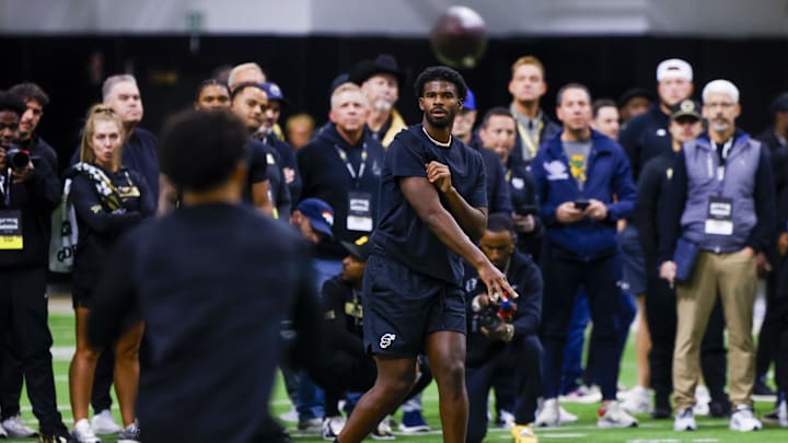 Apr 4, 2025; Boulder, CO, USA; Colorado Buffaloes quarterback Shedeur Sanders (2) passes the ball at the University of Colorado NFL Showcase at the CU Indoor Practice Facility. Mandatory Credit: Michael Ciaglo-Imagn Images