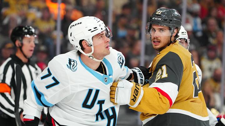 Apr 19, 2026; Las Vegas, Nevada, USA; Vegas Golden Knights center Brett Howden (21) grabs the jersey of Utah Mammoth right wing JJ Peterka (77) during the first period of game one of the first round of the 2026 Stanley Cup Playoffs at T-Mobile Arena. Mandatory Credit: Stephen R. Sylvanie-Imagn Images Apr 19, 2026; Las Vegas, Nevada, USA; Vegas Golden Knights center Brett Howden (21) grabs the jersey of Utah Mammoth right wing JJ Peterka (77) during the first period of game one of the first round of the 2026 Stanley Cup Playoffs at T-Mobile Arena. Mandatory Credit: Stephen R. Sylvanie-Imagn Images