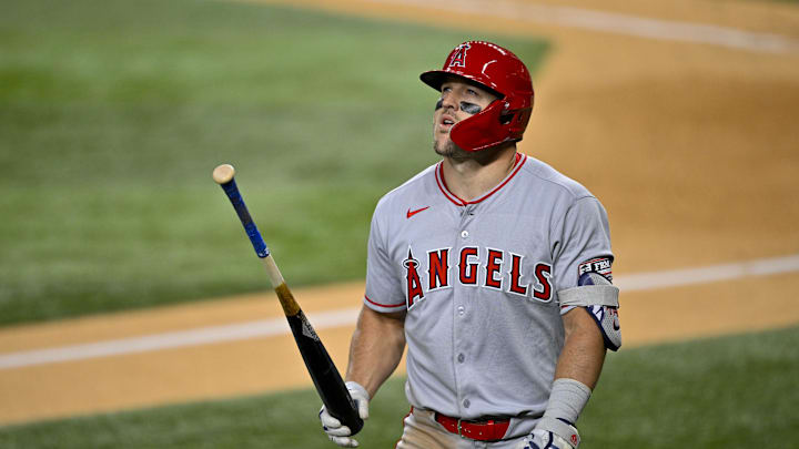 Apr 15, 2025; Arlington, Texas, USA; Los Angeles Angels right fielder Mike Trout reacts to striking out against the Texas Rangers during the sixth inning at Globe Life Field. All MLB players will be wearing the number 42 on Jackie Robinson Day to commemorate Robinson making his major league debut in 1947. Mandatory Credit: Jerome Miron-Imagn Images Apr 15, 2025; Arlington, Texas, USA; Los Angeles Angels right fielder Mike Trout reacts to striking out against the Texas Rangers during the sixth inning at Globe Life Field. All MLB players will be wearing the number 42 on Jackie Robinson Day to commemorate Robinson making his major league debut in 1947. Mandatory Credit: Jerome Miron-Imagn Images