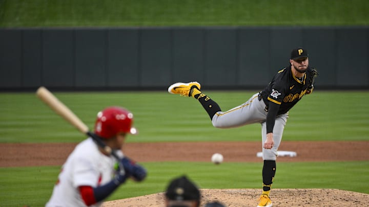 May 6, 2025; St. Louis, Missouri, USA;  Pittsburgh Pirates starting pitcher Paul Skenes (30) pitches against St. Louis Cardinals shortstop Masyn Winn (0) during the third inning at Busch Stadium. Mandatory Credit: Jeff Curry-Imagn Images