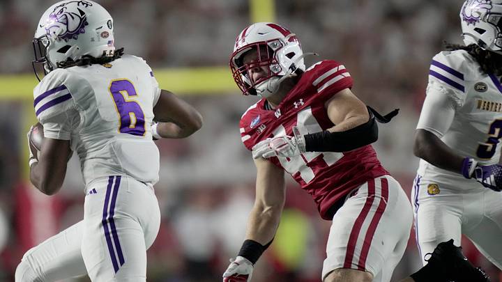 Wisconsin linebacker Cooper Catalano (44) chases Western Illinois running back Josh Robinson (6) during the third quarter of their game Saturday, Sept. 12, 2026 at Camp Randall Stadium in Madison, Wisconsin.