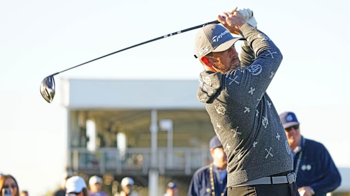 Jets quarterback Aaron Rodgers tees off on the first hole during the Phoenix Open Annexus Pro-Am at TPC Scottsdale on Feb. 5, 2025.