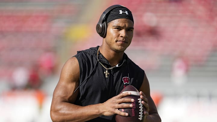 Oct 5, 2024; Madison, Wisconsin, USA;  Wisconsin Badgers wide receiver C.J. Williams (4) during warmups prior to the game against the Purdue Boilermakers at Camp Randall Stadium. Mandatory Credit: Jeff Hanisch-Imagn Images