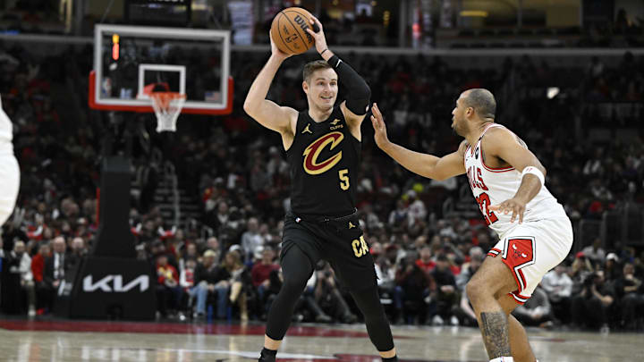 Mar 4, 2025; Chicago, Illinois, USA; Cleveland Cavaliers guard Sam Merrill (5) passes the ball against Chicago Bulls forward Talen Horton-Tucker (22) during the second half at United Center. Mandatory Credit: Matt Marton-Imagn Images Mar 4, 2025; Chicago, Illinois, USA; Cleveland Cavaliers guard Sam Merrill (5) passes the ball against Chicago Bulls forward Talen Horton-Tucker (22) during the second half at United Center. Mandatory Credit: Matt Marton-Imagn Images