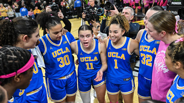 Feb 23, 2025; Iowa City, Iowa, USA; UCLA Bruins center Lauren Betts (far left) and forward Janiah Barker (0) and forward Timea Gardiner (30) and guard Gabriela Jaquez (11) and guard Kiki Rice (1) and forward Angela Dugalic (32) and teammates react after the game against the Iowa Hawkeyes at Carver-Hawkeye Arena. Mandatory Credit: Jeffrey Becker-Imagn Images