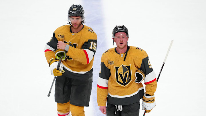 May 8, 2025; Las Vegas, Nevada, USA; Vegas Golden Knights defenseman Noah Hanifin (15) and center Jack Eichel (9) leave the ice after the Edmonton Oilers defeated the Golden Knights 5-4 in overtime of game two of the second round of the 2025 Stanley Cup Playoffs at T-Mobile Arena. Mandatory Credit: Stephen R. Sylvanie-Imagn Images