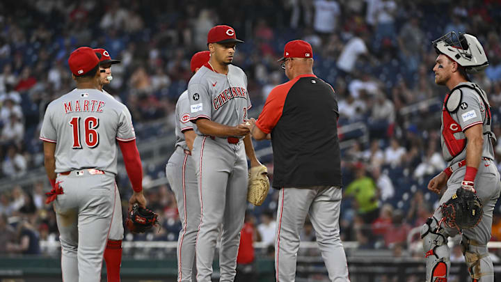 Jul 22, 2025; Washington, District of Columbia, USA; Cincinnati Reds manager Terry Francona (77) removes Cincinnati Reds starting pitcher Chase Burns (26) from the game against the Washington Nationals during the sixth inning at Nationals Park. Mandatory Credit: Brad Mills-Imagn Images Jul 22, 2025; Washington, District of Columbia, USA; Cincinnati Reds manager Terry Francona (77) removes Cincinnati Reds starting pitcher Chase Burns (26) from the game against the Washington Nationals during the sixth inning at Nationals Park. Mandatory Credit: Brad Mills-Imagn Images