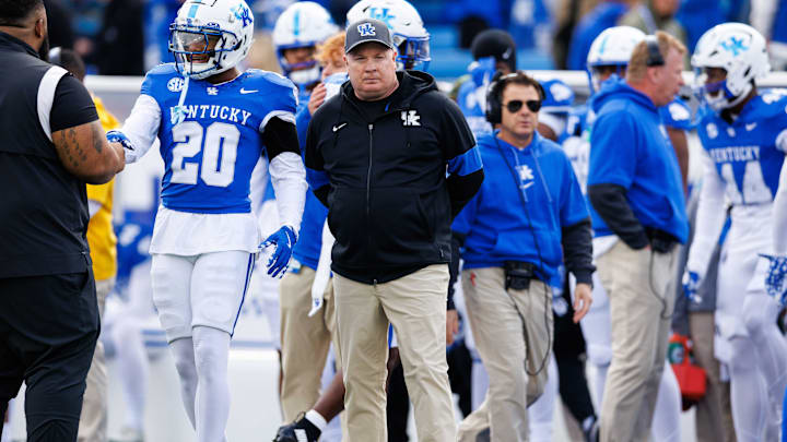 Nov 16, 2024; Lexington, Kentucky, USA; Kentucky Wildcats head coach Mark Stoops stands on the field before the game against the Murray State Racers at Kroger Field. Mandatory Credit: Jordan Prather-Imagn Images