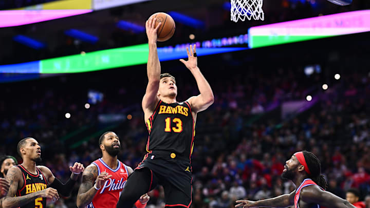 Dec 8, 2023; Philadelphia, Pennsylvania, USA; Atlanta Hawks guard Bogdan Bogdanovic (13) shoots against the Philadelphia 76ers in the second quarter at Wells Fargo Center. Mandatory Credit: Kyle Ross-USA TODAY Sports Dec 8, 2023; Philadelphia, Pennsylvania, USA; Atlanta Hawks guard Bogdan Bogdanovic (13) shoots against the Philadelphia 76ers in the second quarter at Wells Fargo Center. Mandatory Credit: Kyle Ross-USA TODAY Sports
