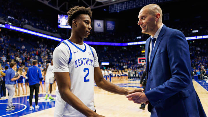 Nov 9, 2024; Lexington, Kentucky, USA; Kentucky Wildcats head coach Mark Pope talks with guard Jaxson Robinson (2) after the game against the Bucknell Bison at Rupp Arena at Central Bank Center. Mandatory Credit: Jordan Prather-Imagn Images